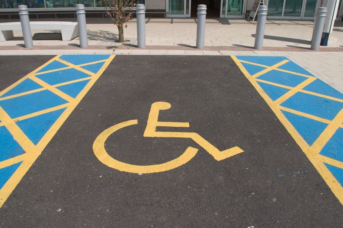 A sign of person with disability (PWD) on the ground