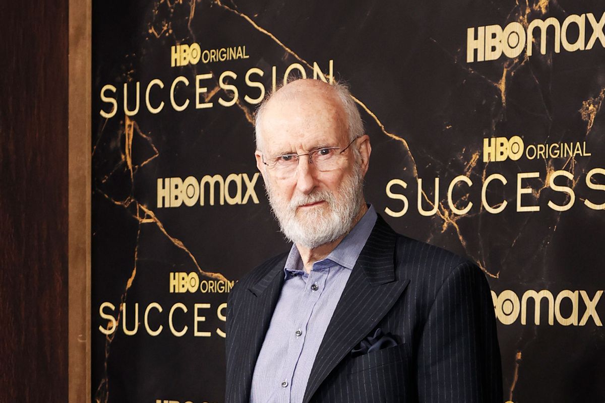 James Cromwell looking at the camera and on his back is an HBO design background