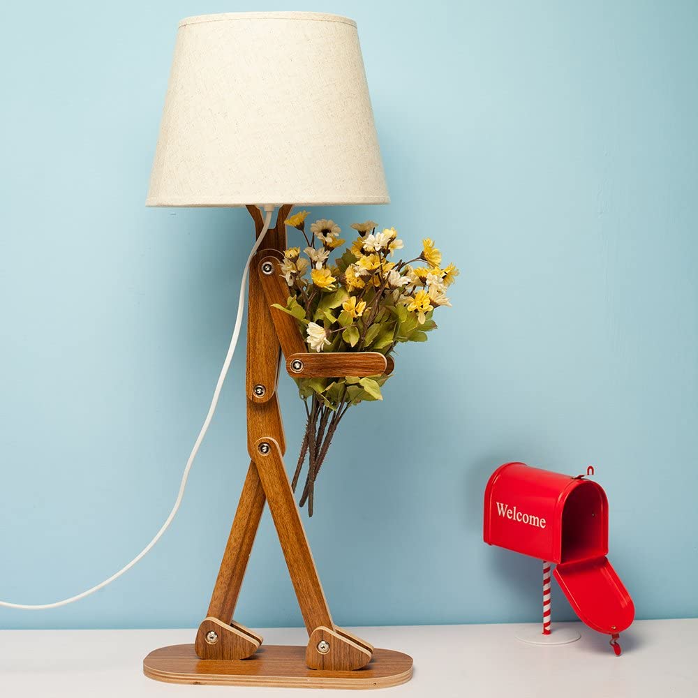 A flower carrying Man Adjustable Wooden Lamp on a light blue bg
