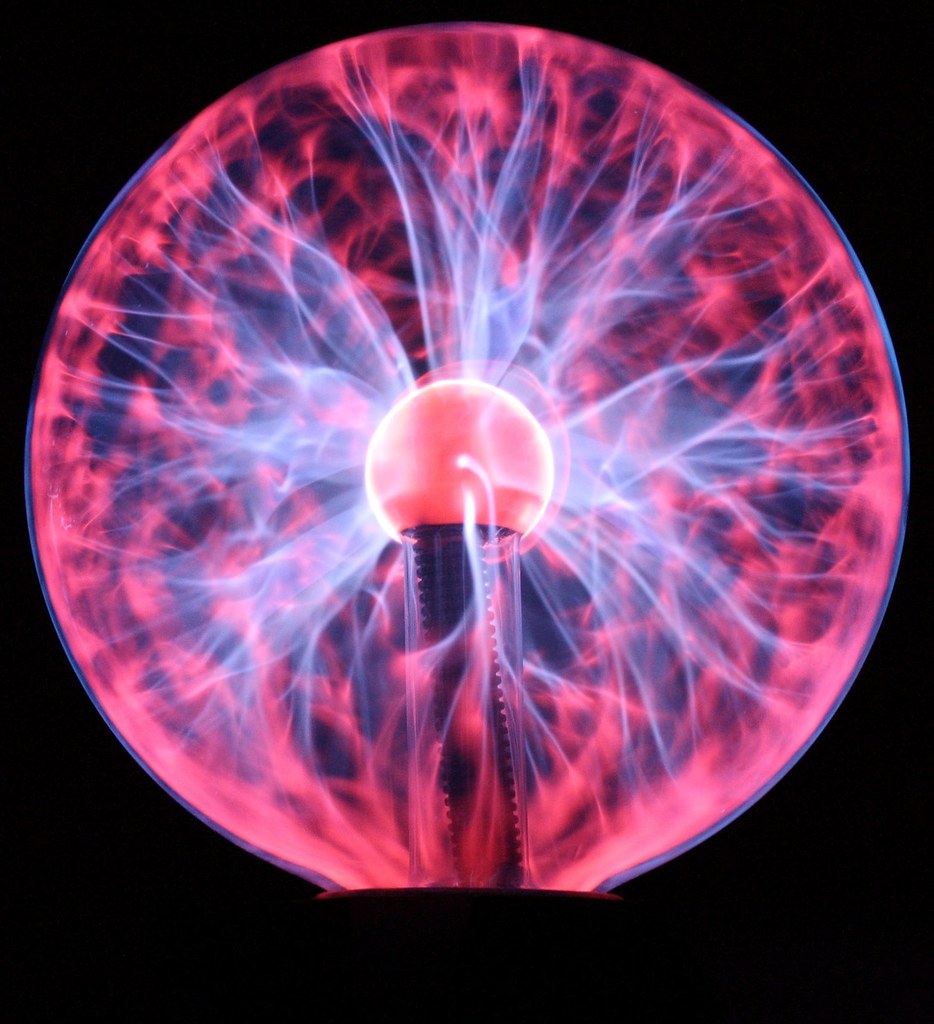 Pink and blue plasma activated in a plasma ball