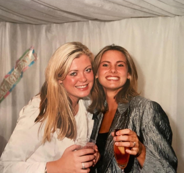 Young gemma wearing a white shirt with her best friend wearing a silver-black jacket on a black shirt