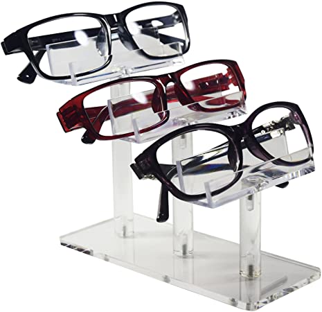 Sunglass standwith 3 different colored framed reading glasses on it