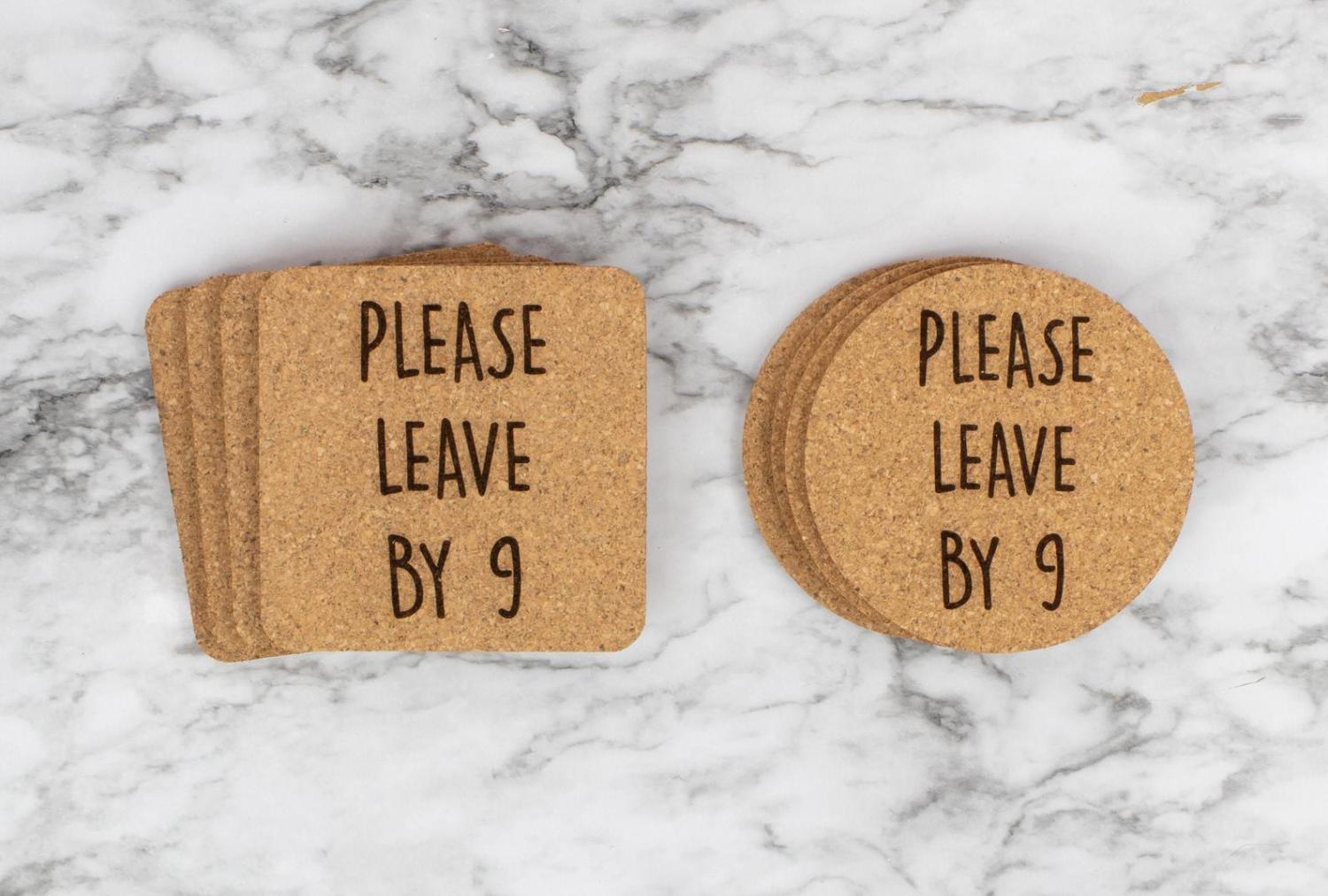 Round and square-shaped 'please leave by nine coasters set' on a white-grey marble surface