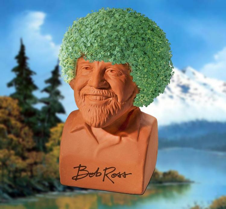 Brown sculpture of bob ross with green hair 
