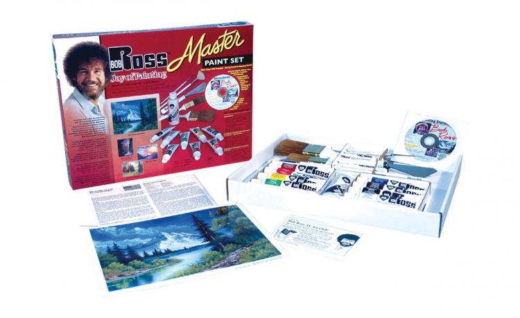 Red-colored bob ross master paint set which includes paintbrushes, paint tubes and his famous painting