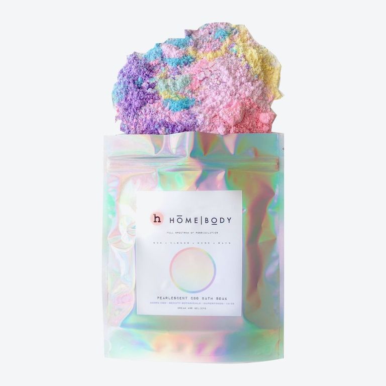 Multicolored bath bomb in a multicolored pack