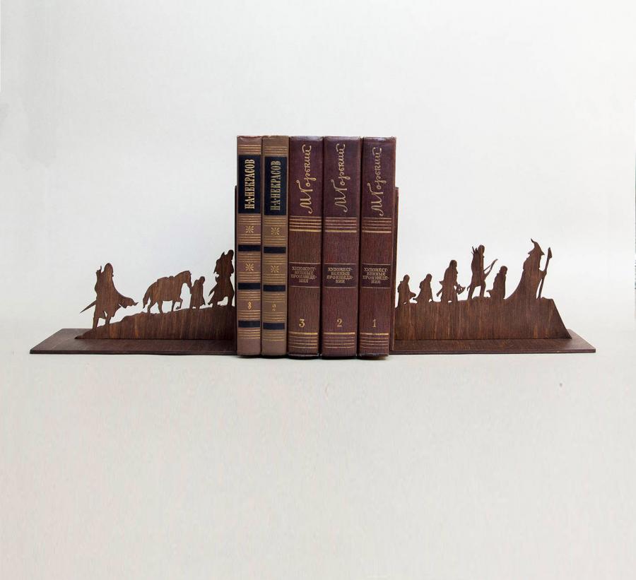 Brown colored lord of the rings bookend between brown books
