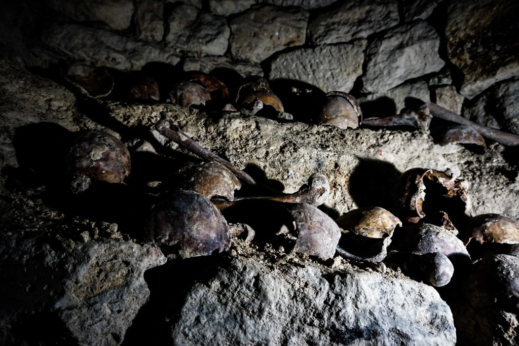 A close up shot of human skulls in Catacombs Of Paris