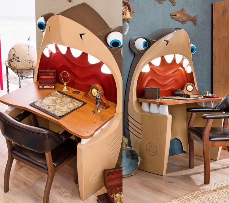 Dark and light brown colored pirate shark kids desk with  a brown colored table mat and a clock along with brown chair