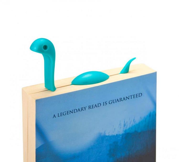 Blue colored Nessie tail bookmark in a blue-colored book