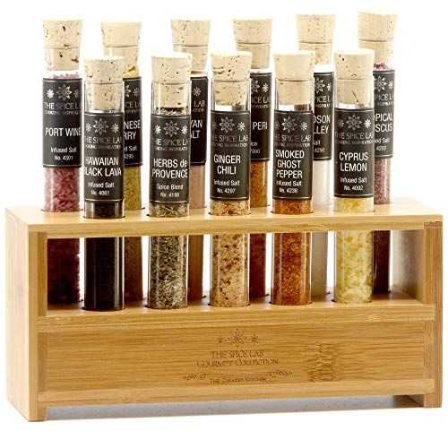 11 spice samples in a wooden box including Cyprus lemon, Hawaiian black lava, ginger chili, smoked ghost pepper, etc.