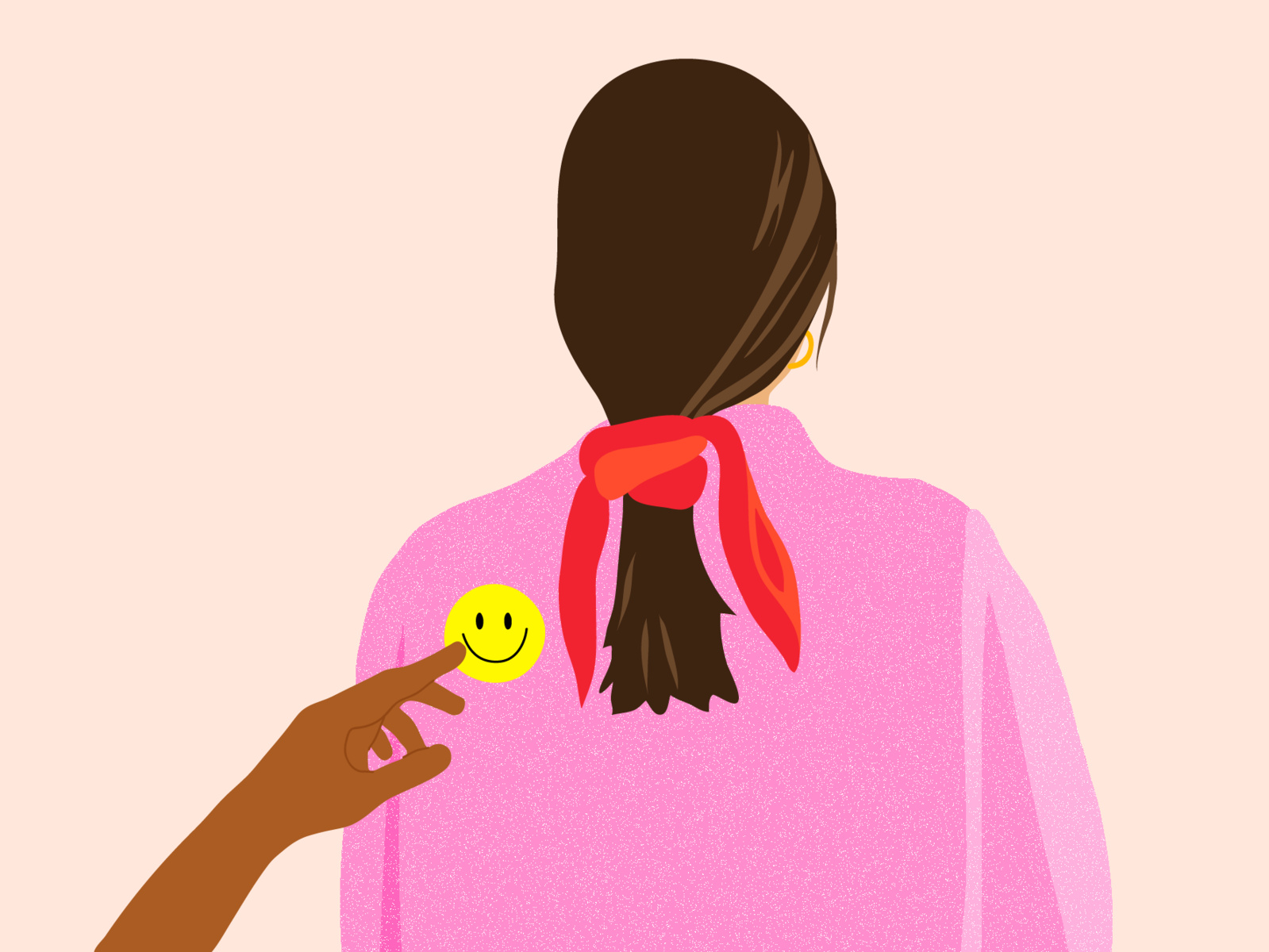 A woman wearing a pink top with red scrunchie, a smiley face on her back while a hand is pointing at the smiley face emoji