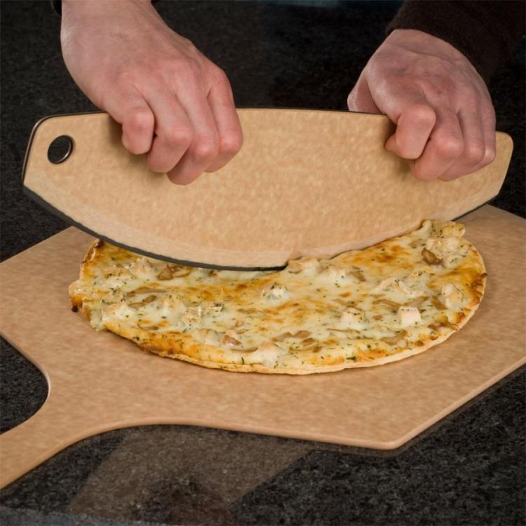 Epicurean pizza cutter cutting pizza on a cutting board