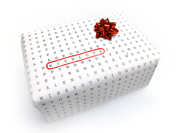 White word scribble paper wrapped on a box with red ribbon