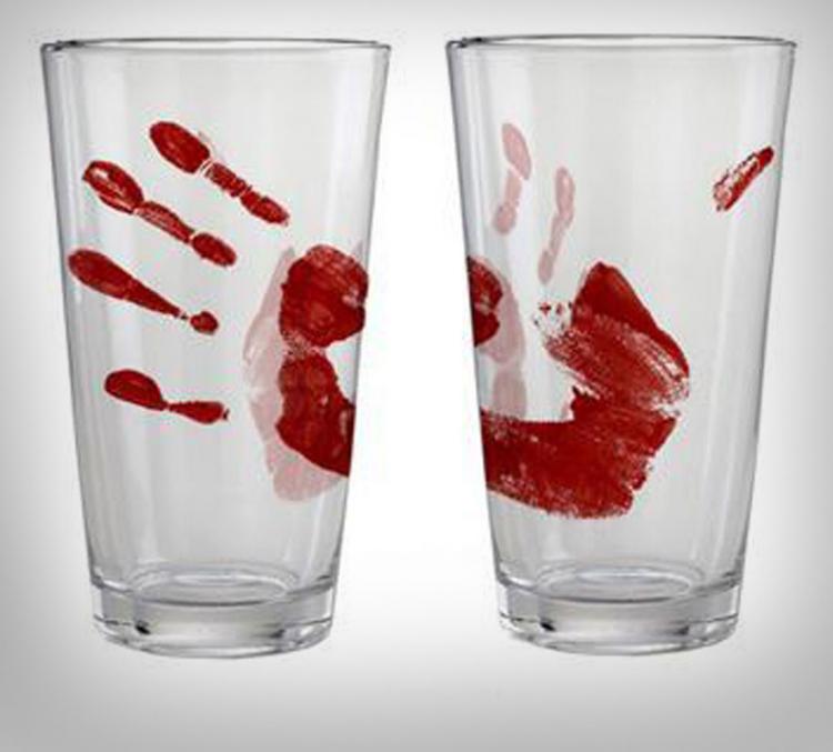 Blooded handprints on glasses