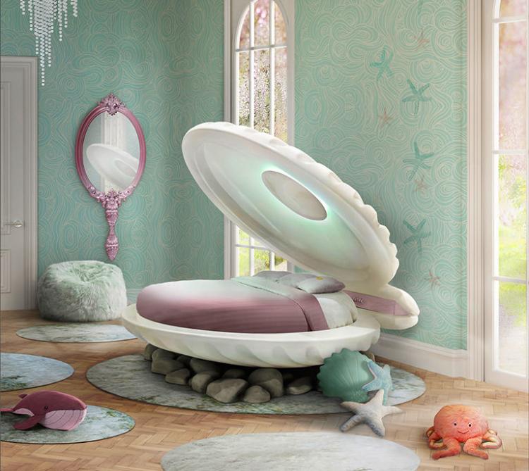 Seashell themed bed in white and green color on grey colored stones