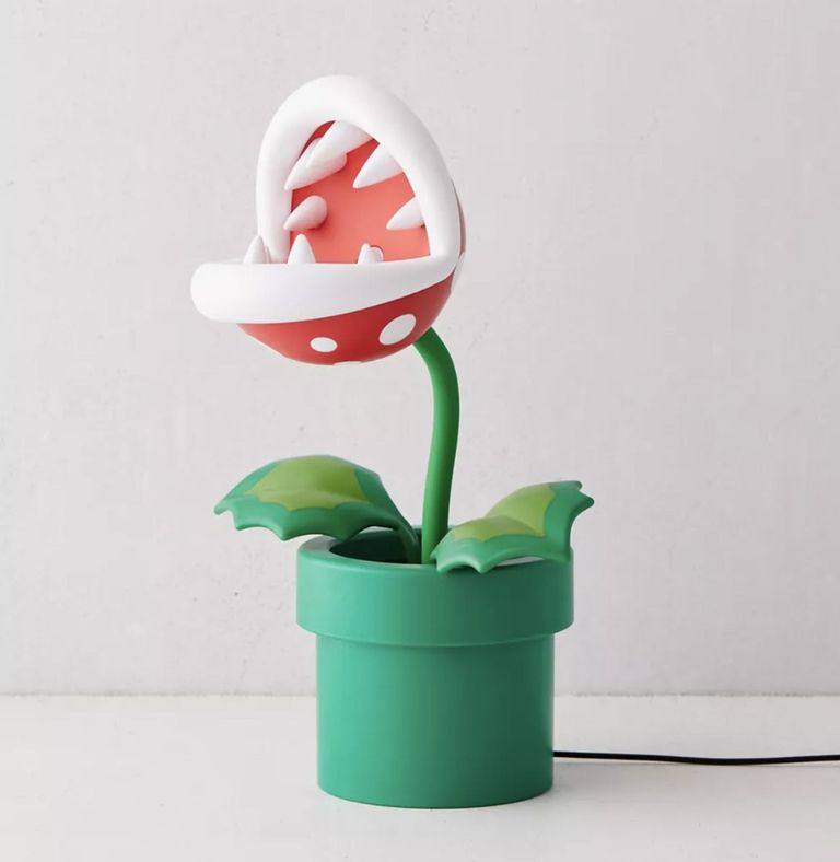 Animated piranha flower night light in a green colored pot