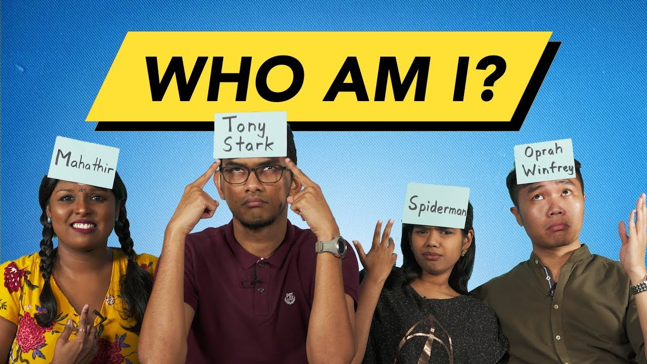 Four friends enjoying the who am I game with yellow paper attached on their heads