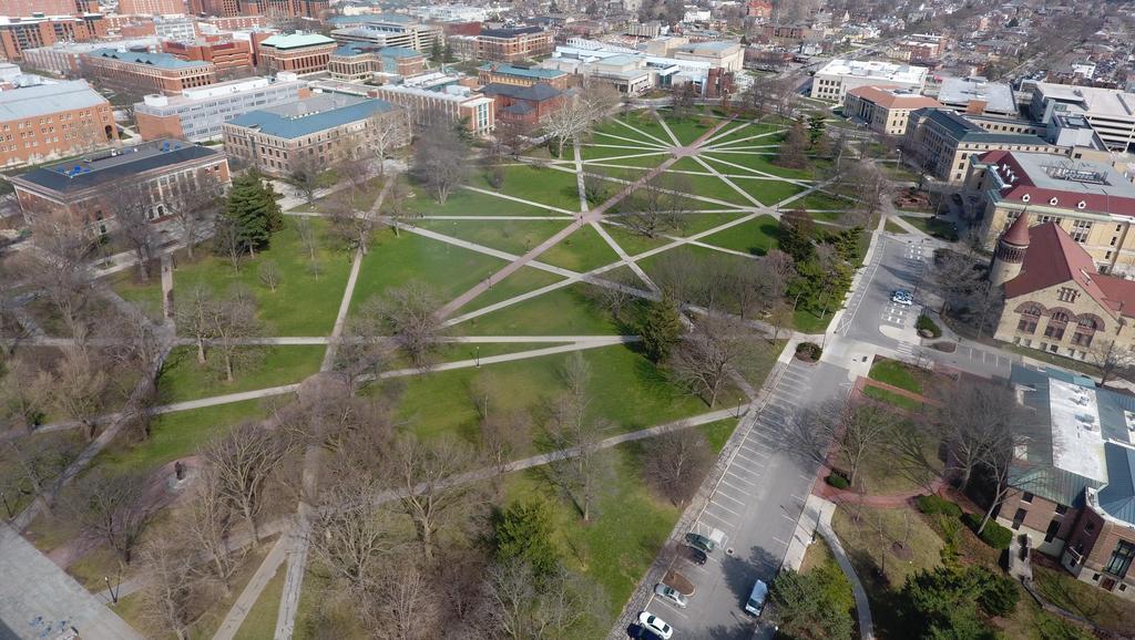 A drone shot of oval-shaped and geometrical pattern of Ohio university walkways