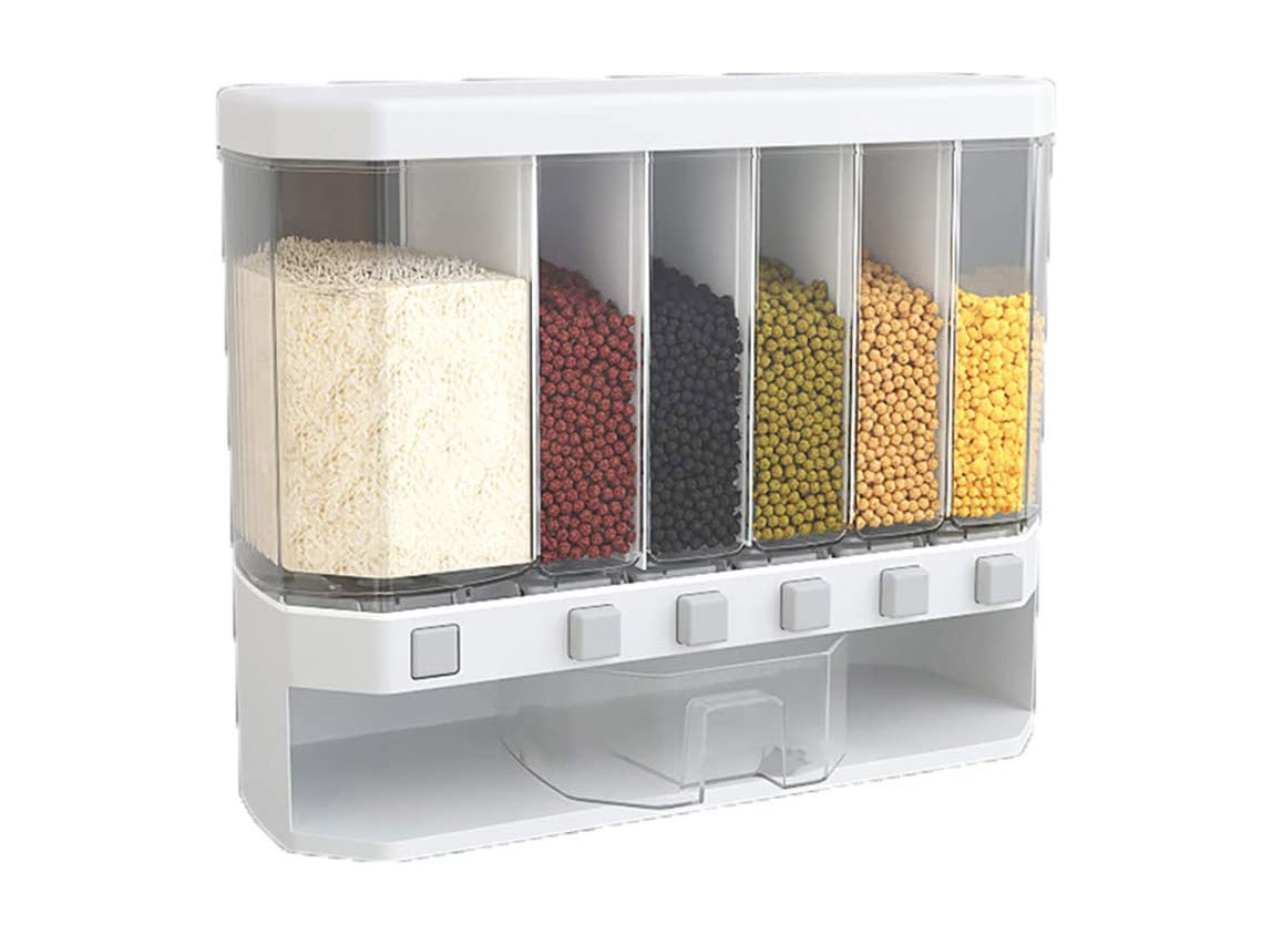 Transparent wall mounted food dispenser filled with multi-colored pulses and rice
