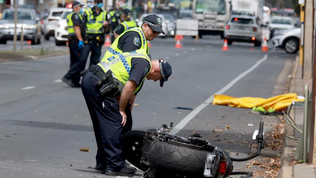 A police officers are checking the damages after a motor accident in the road