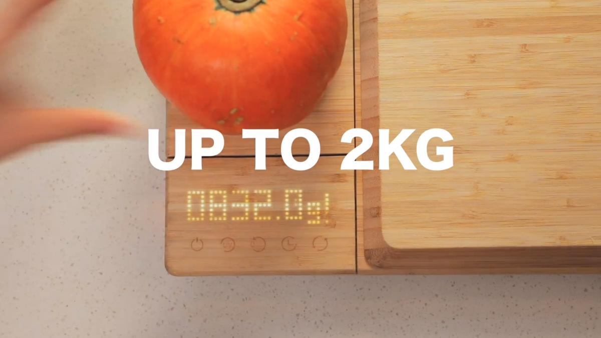 A vegetable weighing on a Smart Chop Smart Cutting Board