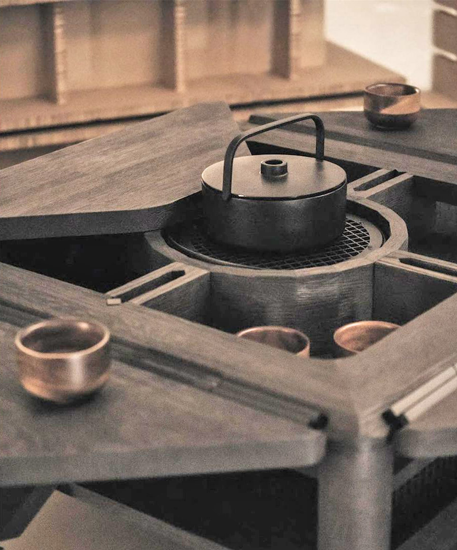 Hasu Japanese Inspired Tea Table inside view with teacups and a kettle