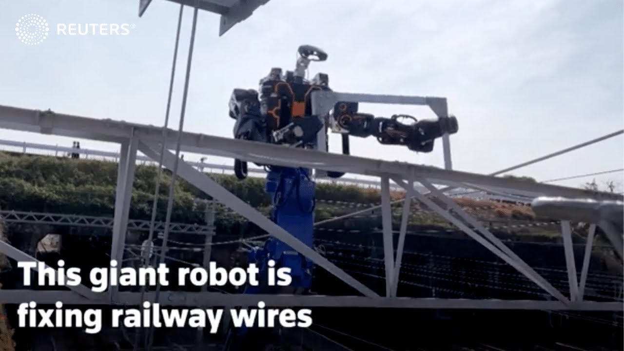 Giant railway robot fixing railway lines in Japan