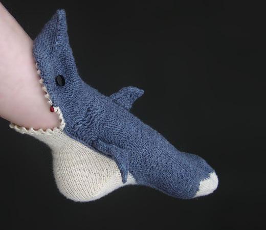 Blue and white biting shark-themed socks