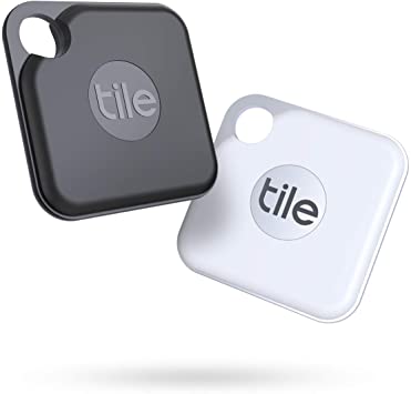 A black and a white Tile Pro Bluetooth trackers