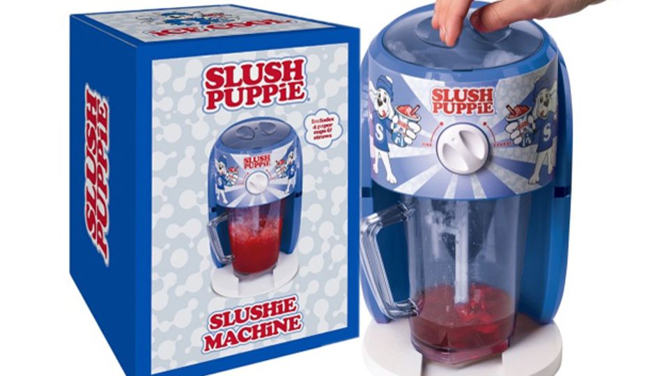 Blue colored machine making red-colored slush in a jug