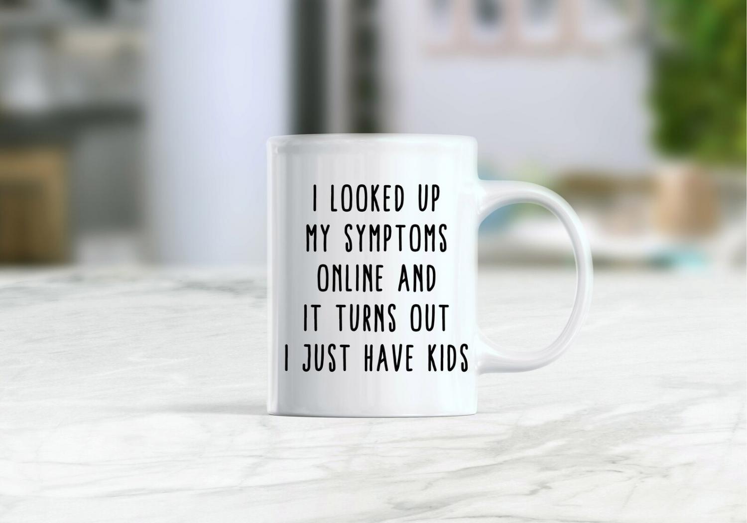 Black colored 'I Looked Up My Symptoms Online And It Turns Out I Just Have Kids' written on a white mug with white handle