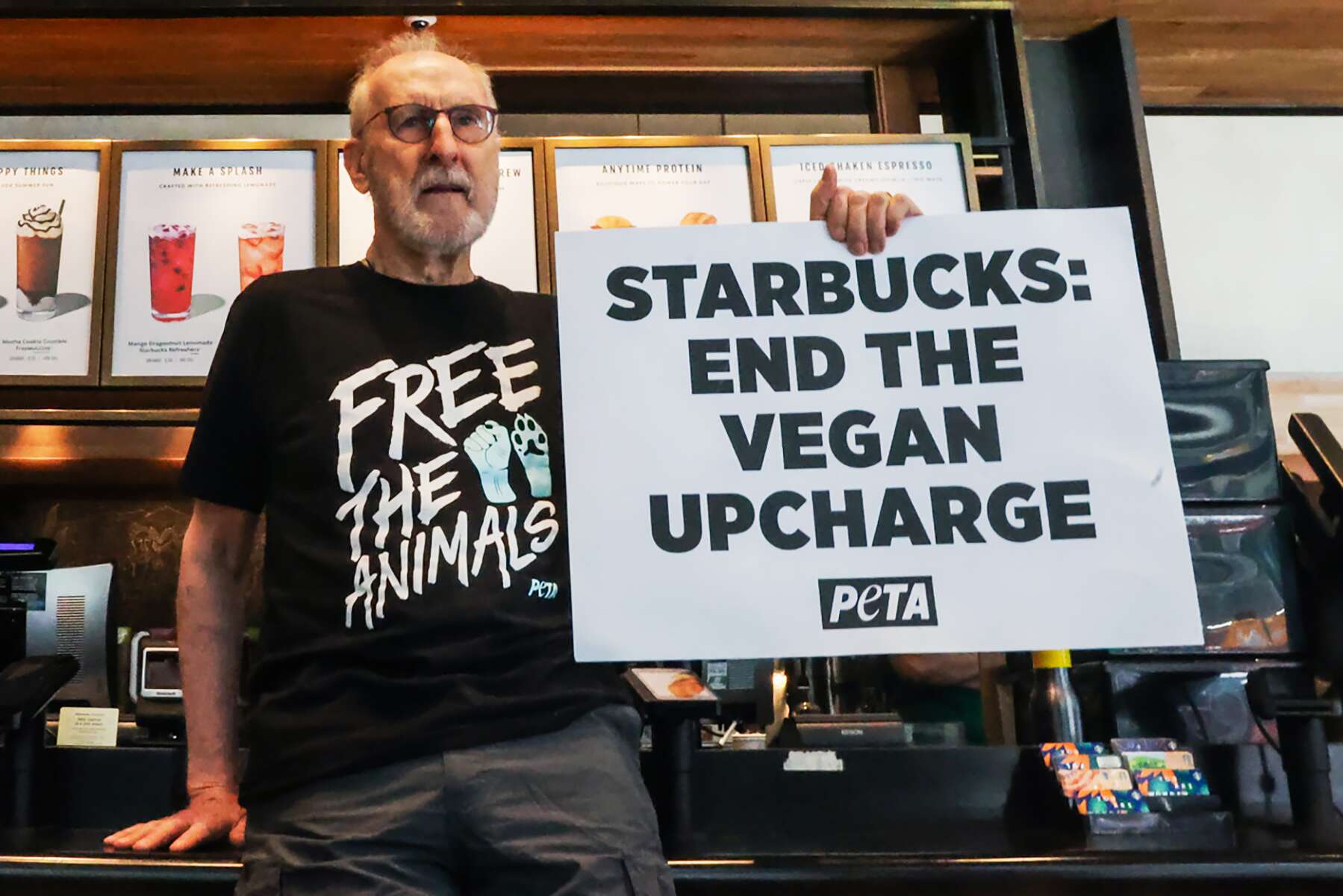 James Cromwell Protest On Vegan Milk Price Hike At Starbucks Counter