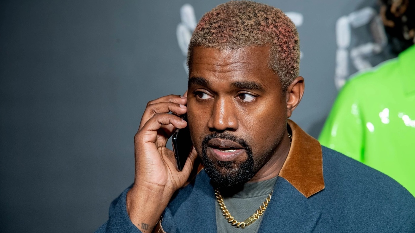 Kanye West talking to someone on the phone