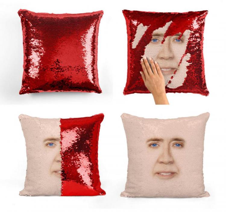 Red sequin pillow with Nicolas cage face imprinted on it