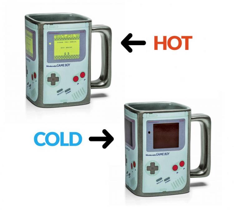 Two grey colored color changing mugs with imprinted game screen