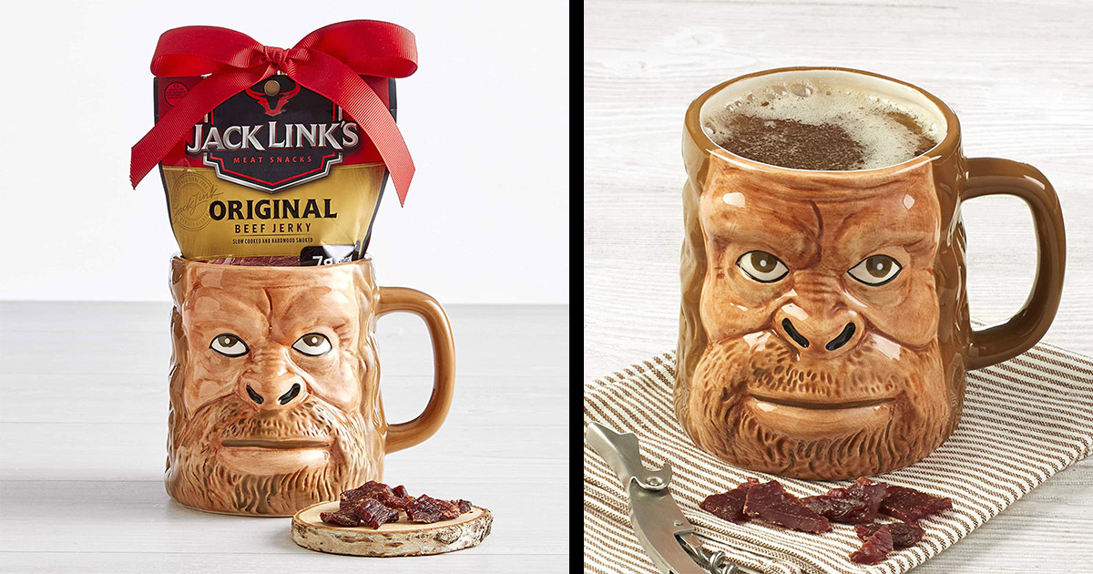 Brown colored jack links sasquatch coffee mug with a beef jerky gift set on a white surface