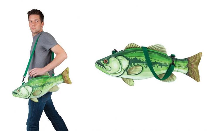 A grey shirt and blue jeans-wearing man holding a giant green colored fish-shaped cooler