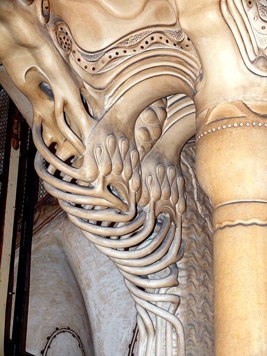 A closed view of skin-white colored pillar work of casa sayrach