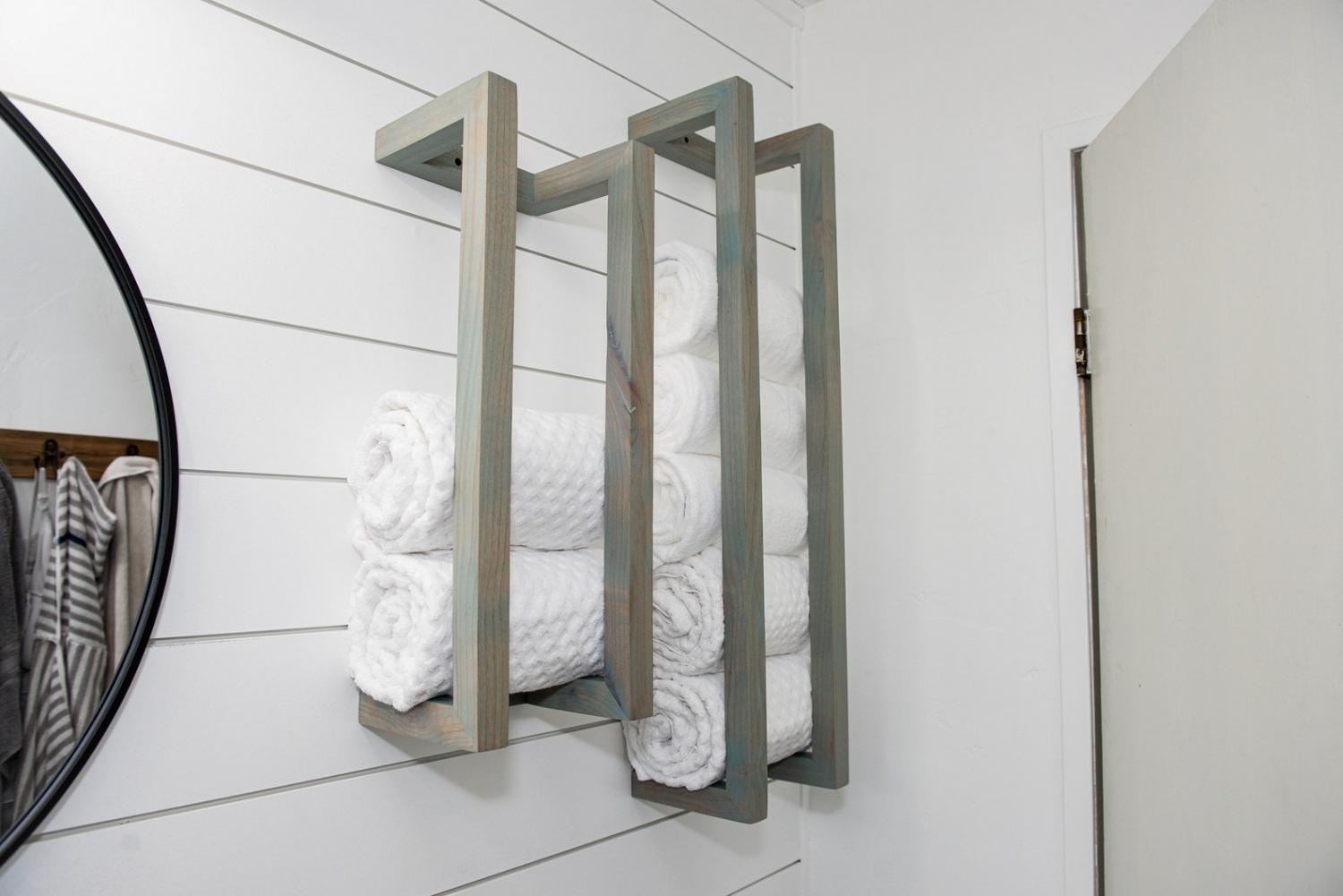 Grey wooden Farmhouse Style Towel Rack on a white wall