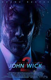 John wick character holding a gun in a dim light background