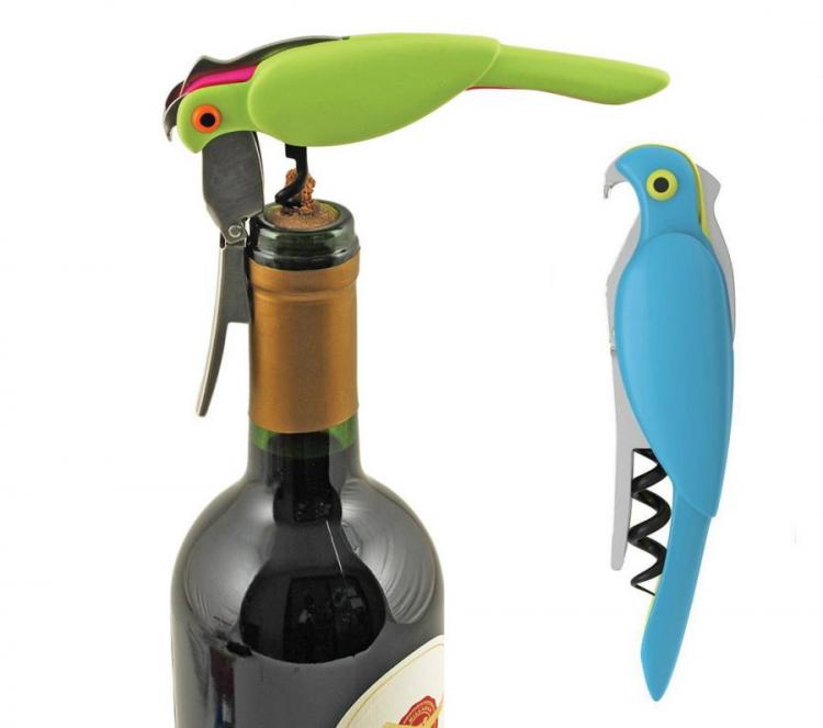 Green and blue colored parrot shaped cork remover on a dark green wine bottle