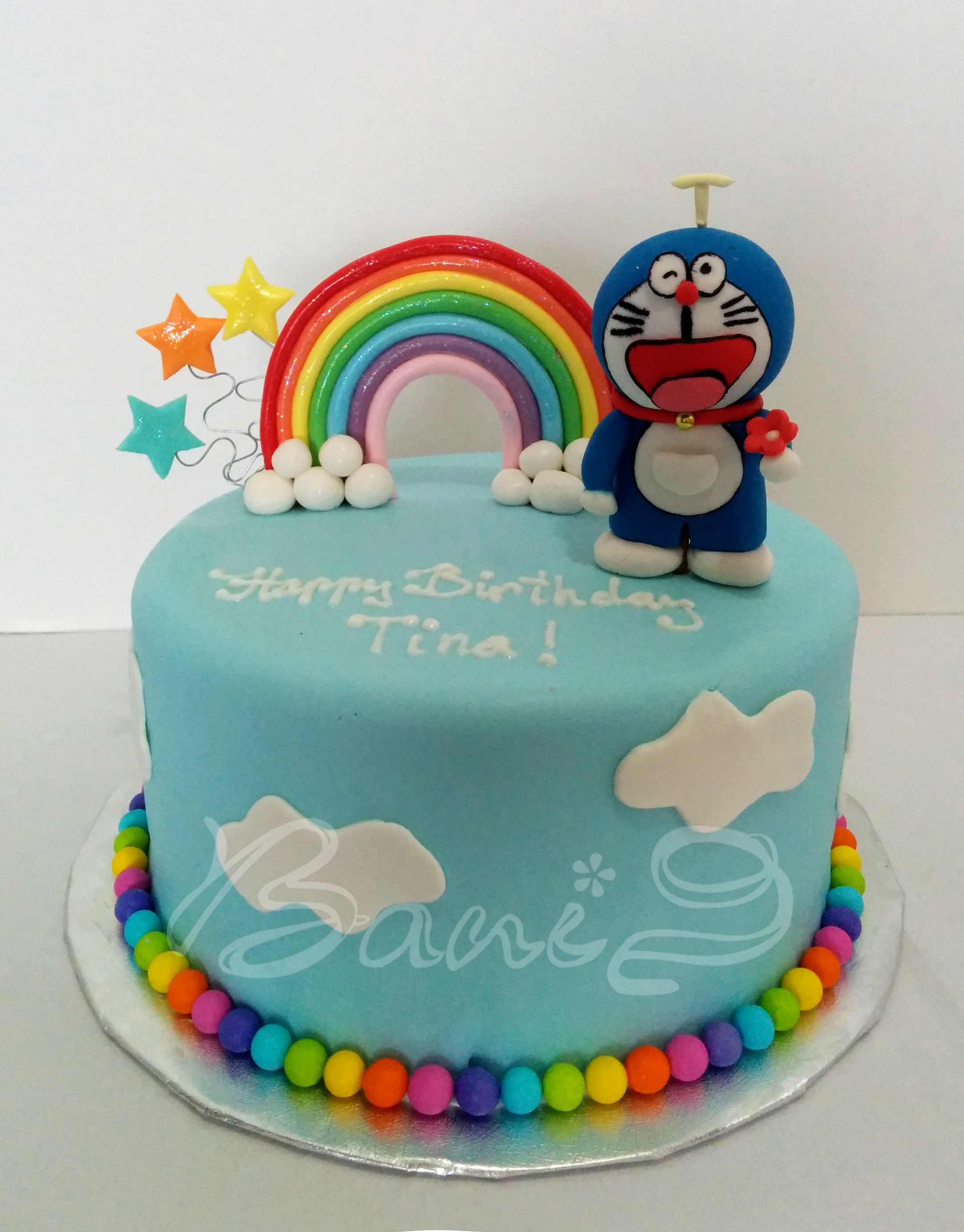 Blue colored with rainbow and clouds Doraemon-Themed Cake
