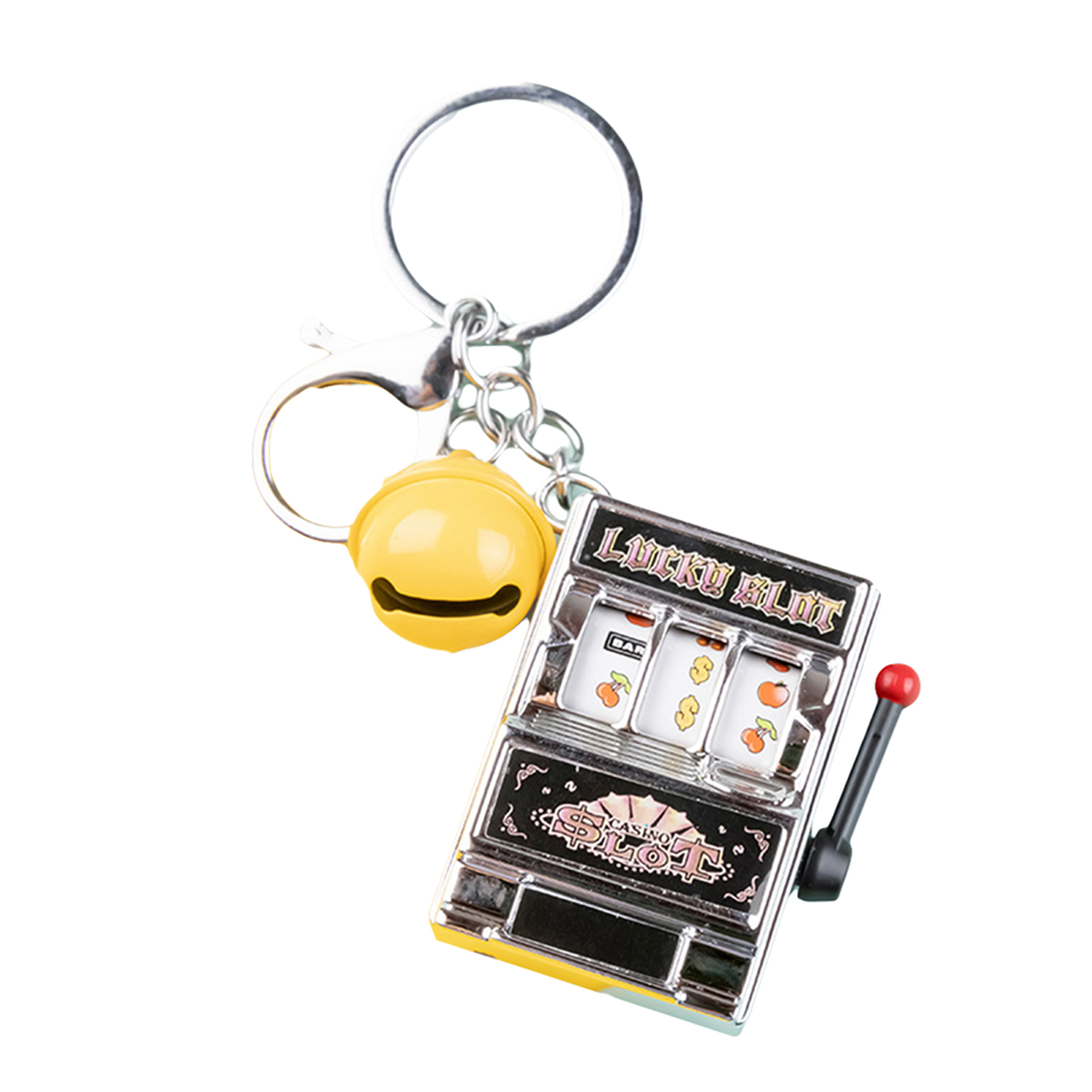 Fruit slot machine keychain with a yellow bell attached to it