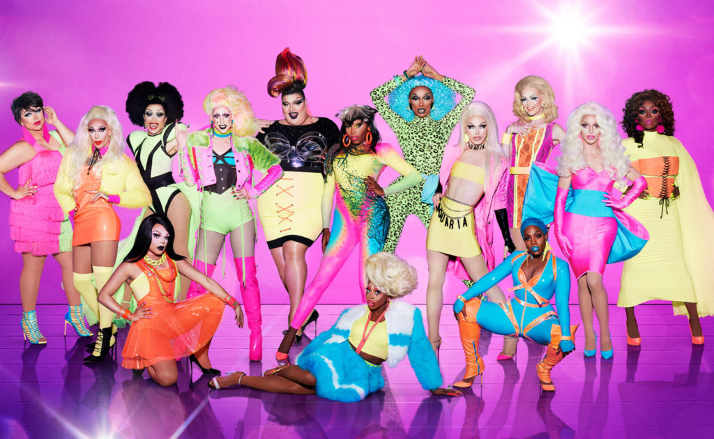 A group of drag queen posing for photoshoot