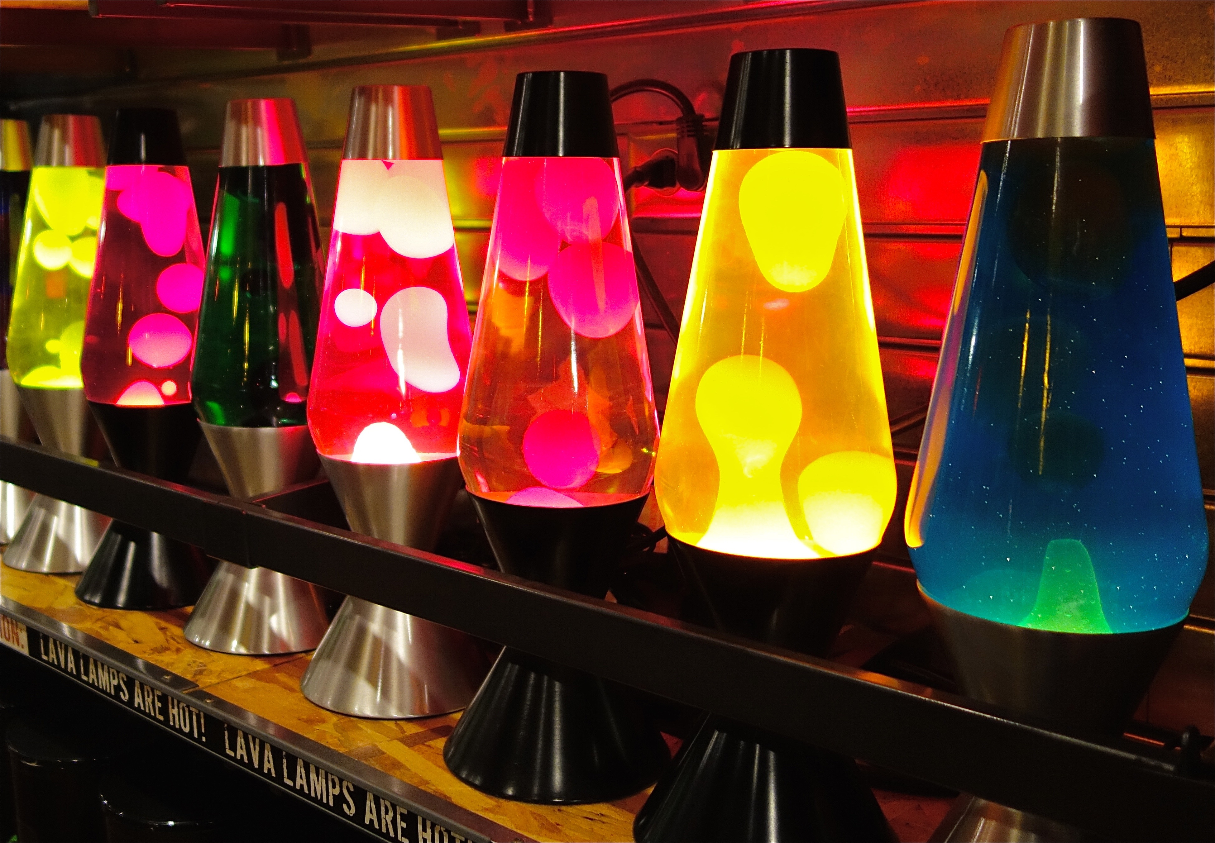 Green, yellow, pink, red, and blue lava lamps