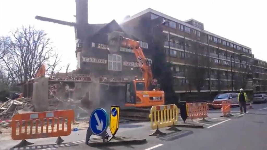Carlton Tavern London being demolished by crane