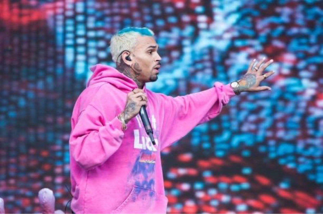 Chris wearing a pink hoodie at Wireless Festival