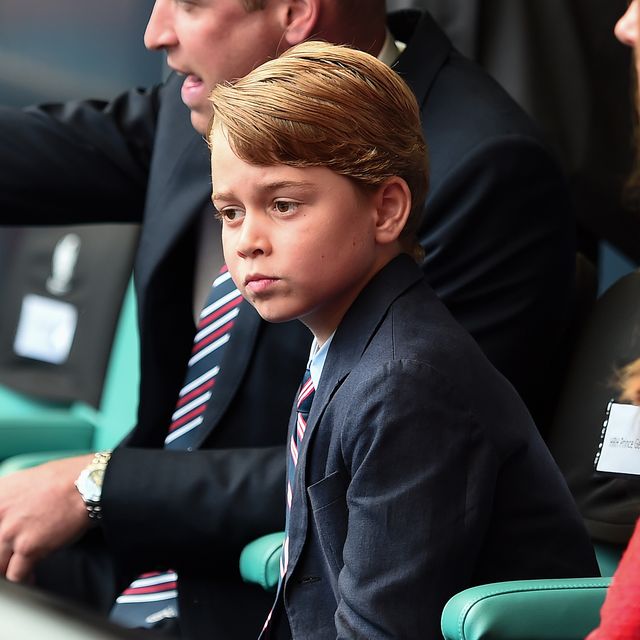 Prince George sitting and watching during a live sports event