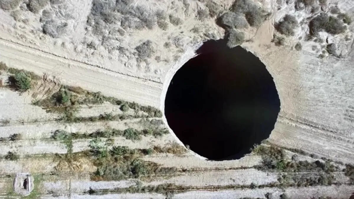 Aerial view of a large sinkhole in Chile